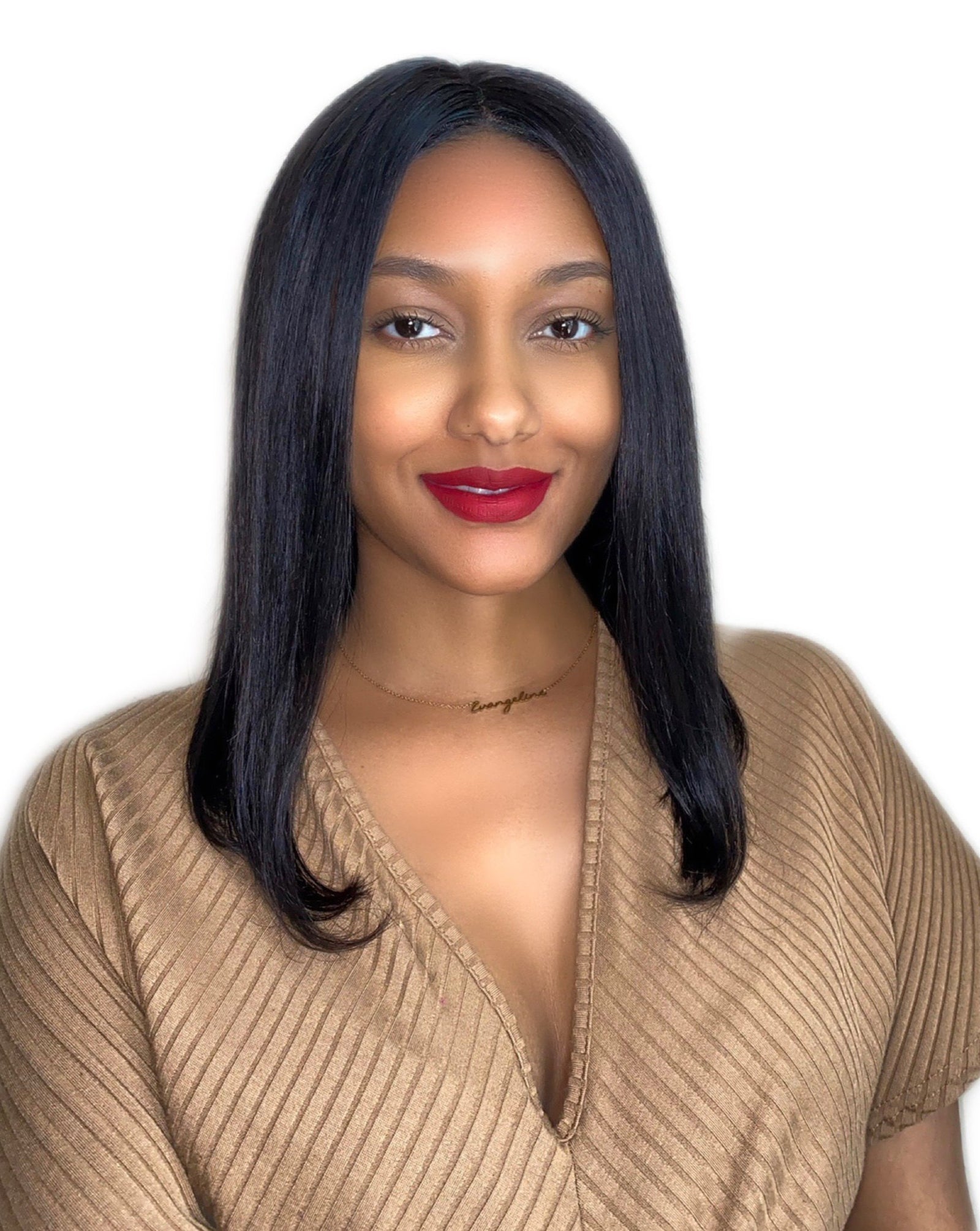 Woman demonstrates how a wearing a lob wig can create appearance of elongated features