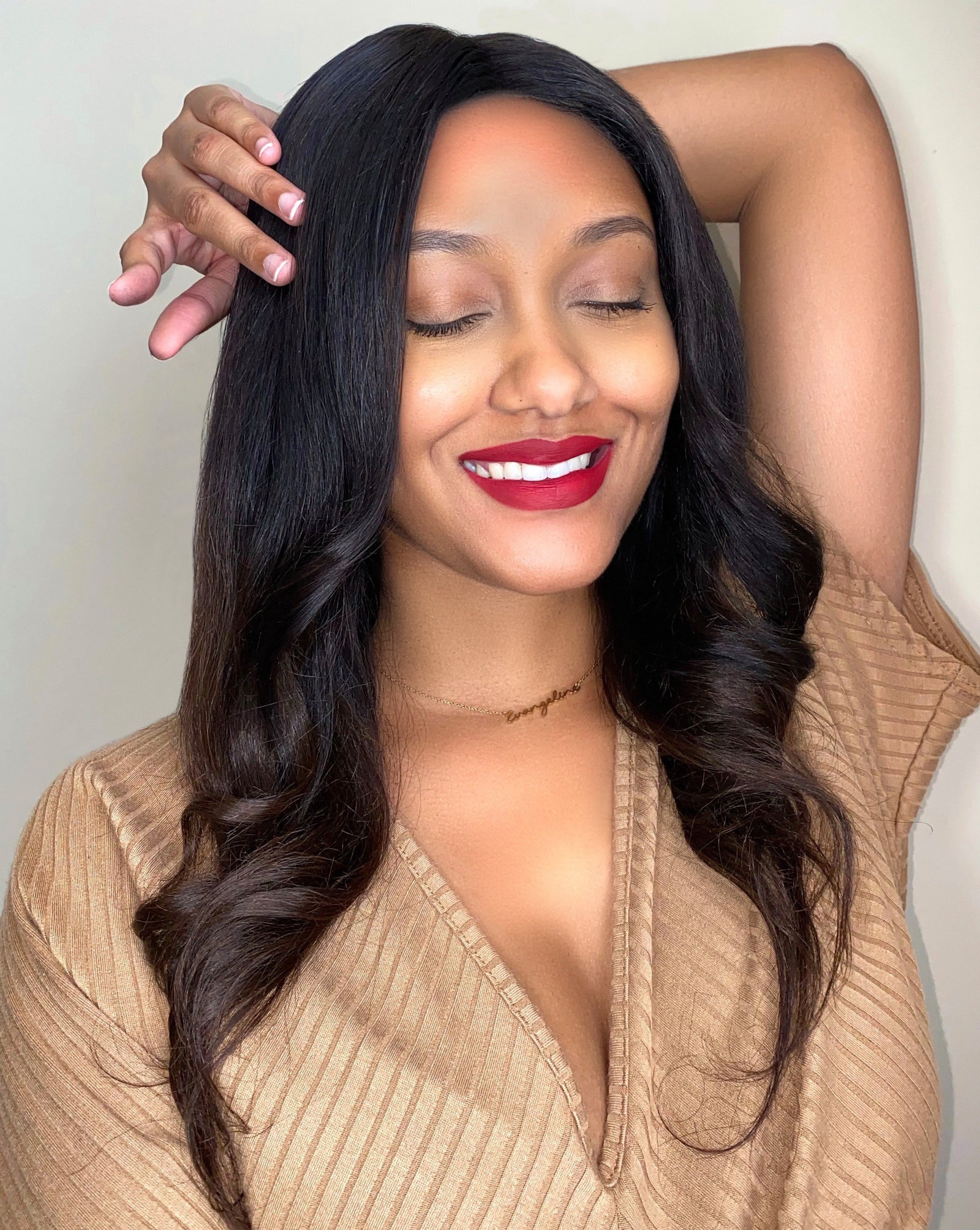 Woman wearing dark ombre wig